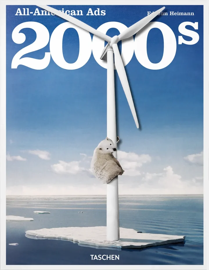 Cover of All-American Ads of the 2000s published by TASCHEN. The image shows a polar bear clinging to a wind turbine against a backdrop of melting ice, symbolizing the environmental concerns of the 2000s.