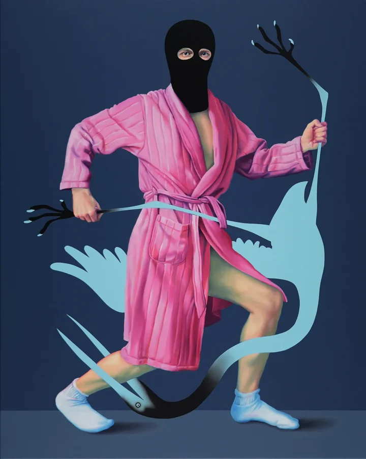 Masked figure in a pink robe wrestling with a blue heron – painting by Máté Orr.